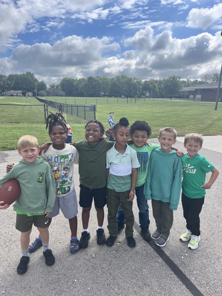 Students celebrating homecoming week with GREEN Homecoming Spirit!