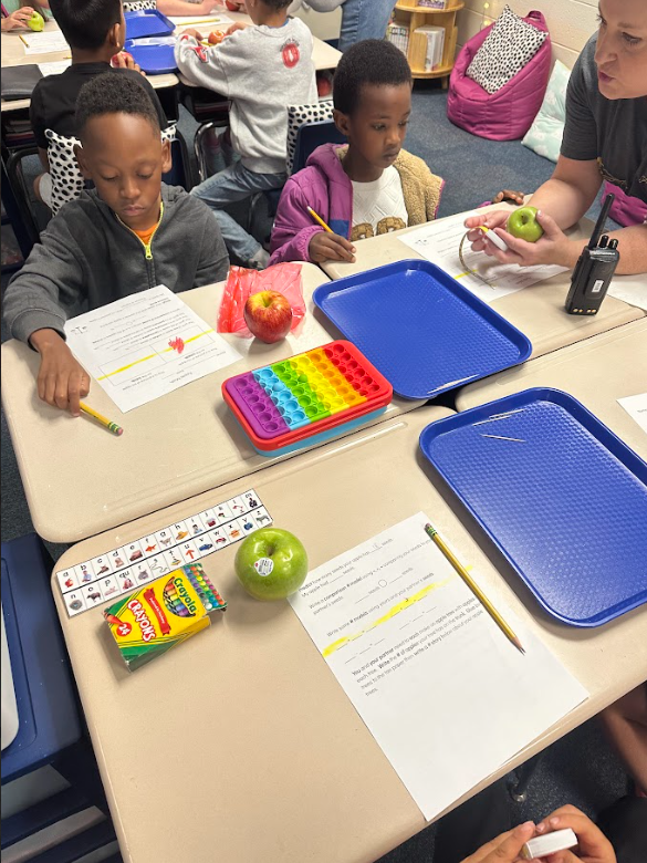 2nd grade students doing apple math