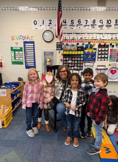 Staff and students dressed in flannel for spirit day