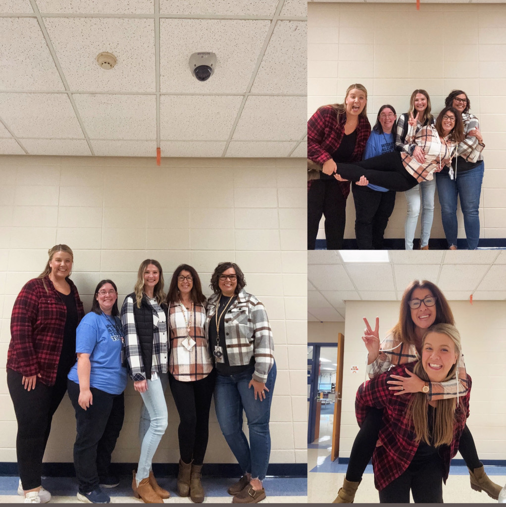 staff dressed in flannel for spirit day