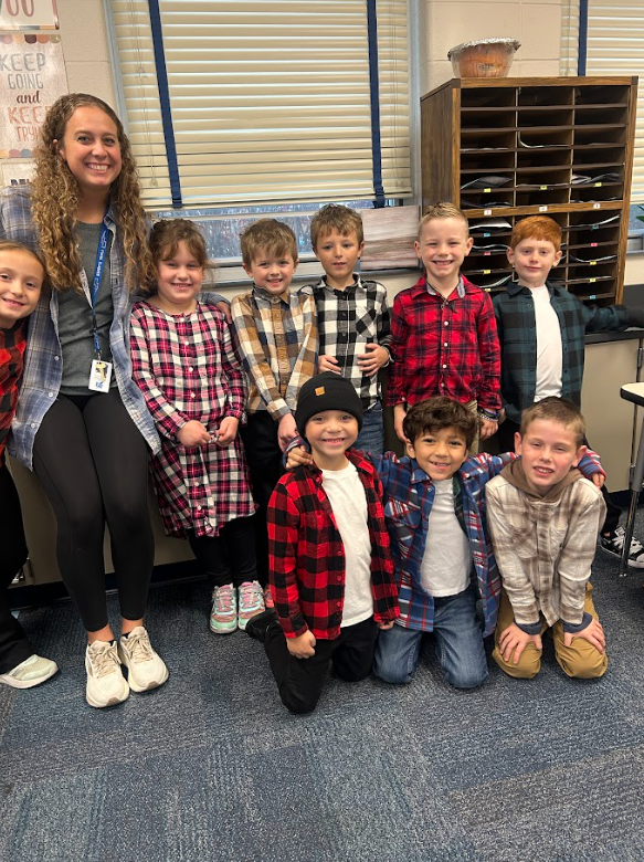 Staff and students dressed in flannel for spirit day