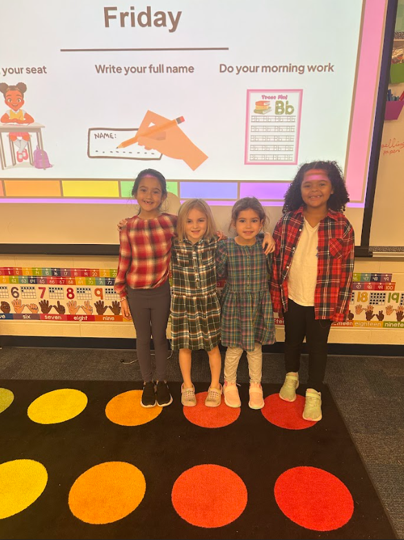 Staff and students dressed in flannel for spirit day