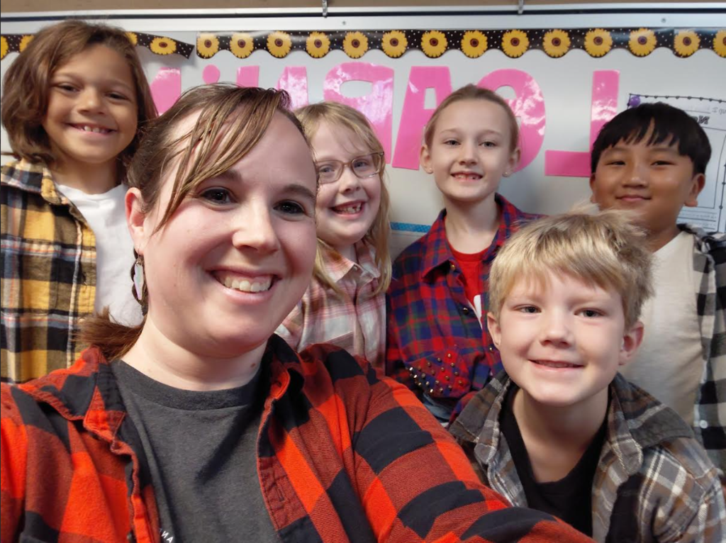 Teacher with students in flannel