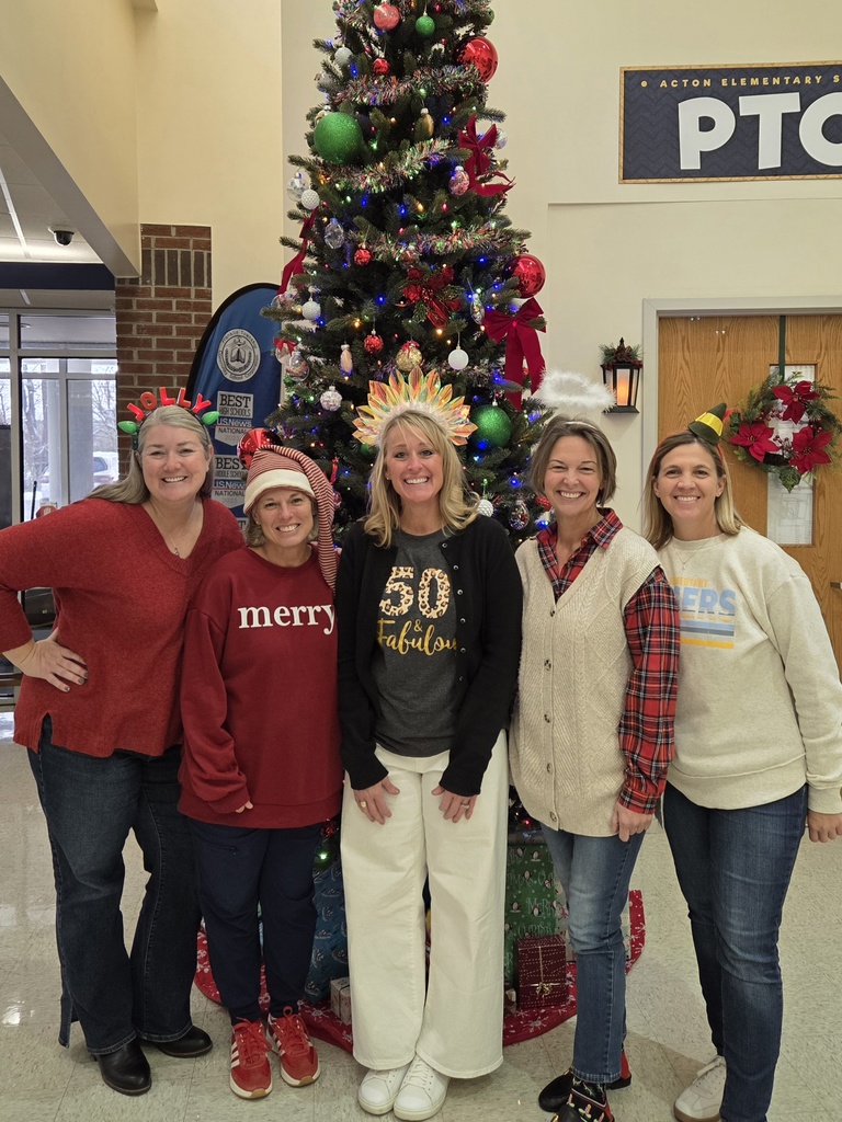 Holiday Hair Don't Care. Staff wears their festive hats