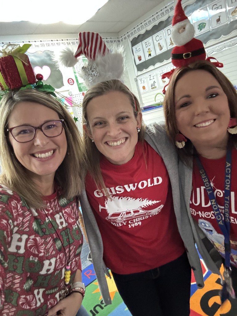 Holiday Hair Don't Care. Staff wears their festive hats