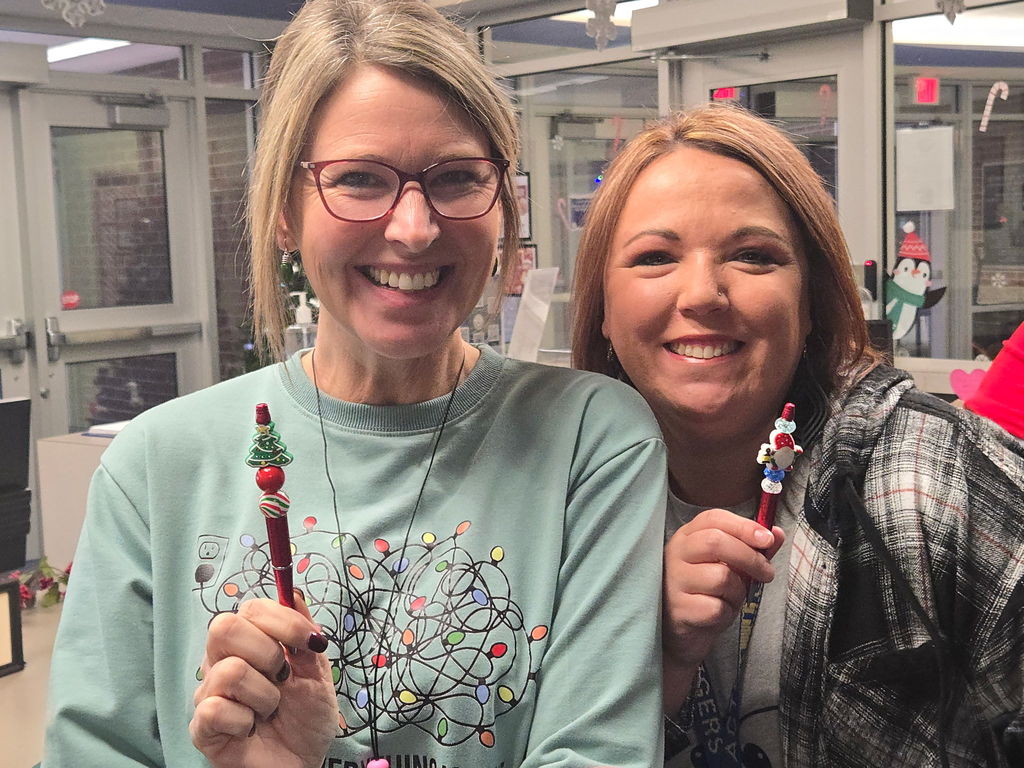 Staff make handcrafted festive holiday pens.