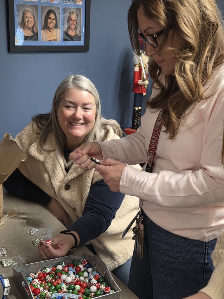 Staff make handcrafted festive holiday pens.