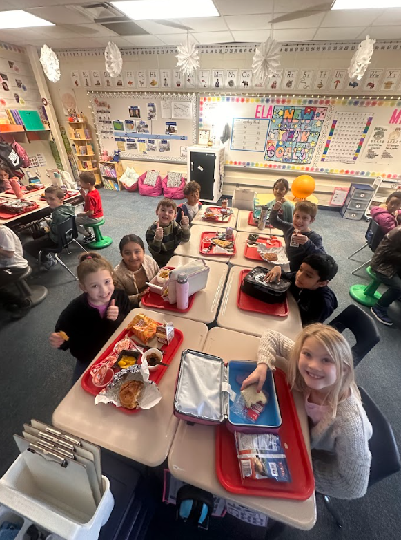 2nd grade students eating lunch in the classroom 