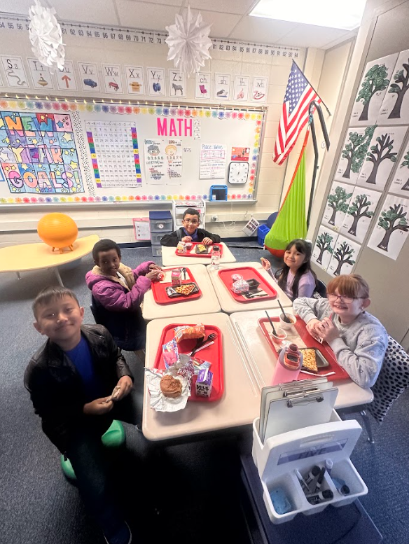 2nd grade students eating lunch in the classroom 