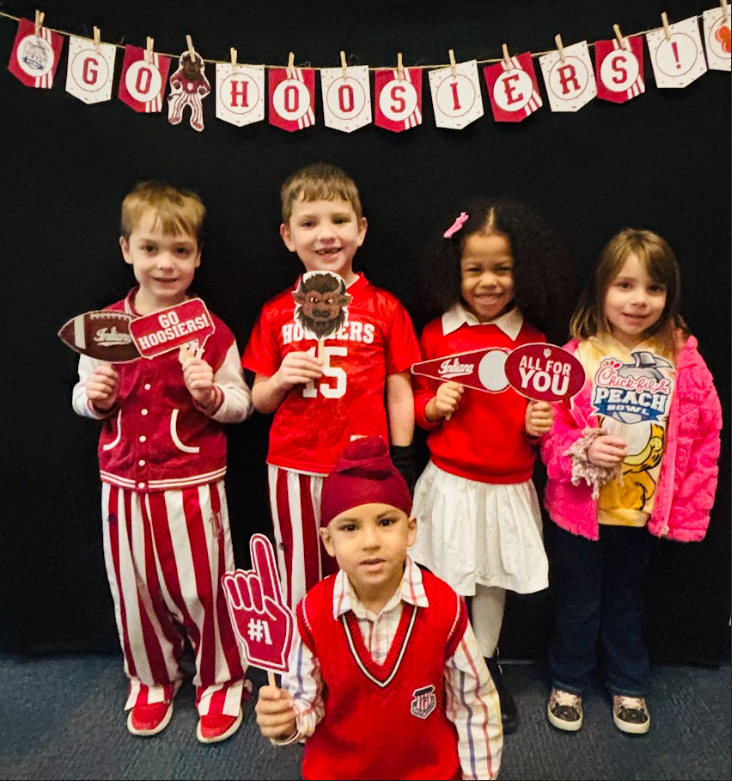 kindergarten students dressed in IU gear celebrating the National Championship win