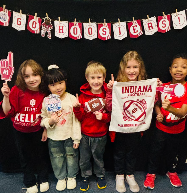 kindergarten students dressed in IU gear celebrating the National Championship win