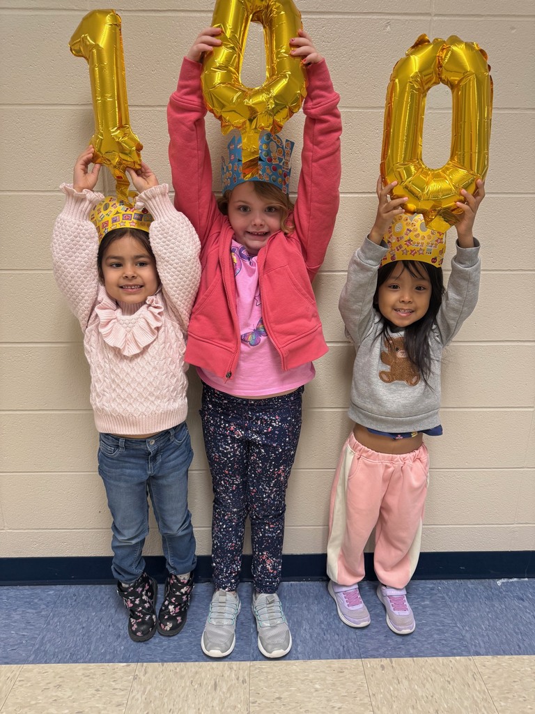 Mini Merks smiling for the 100th day of school