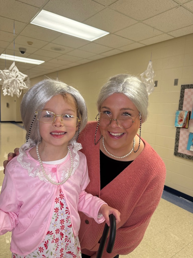 Mini Merks smiling for the 100th day of school