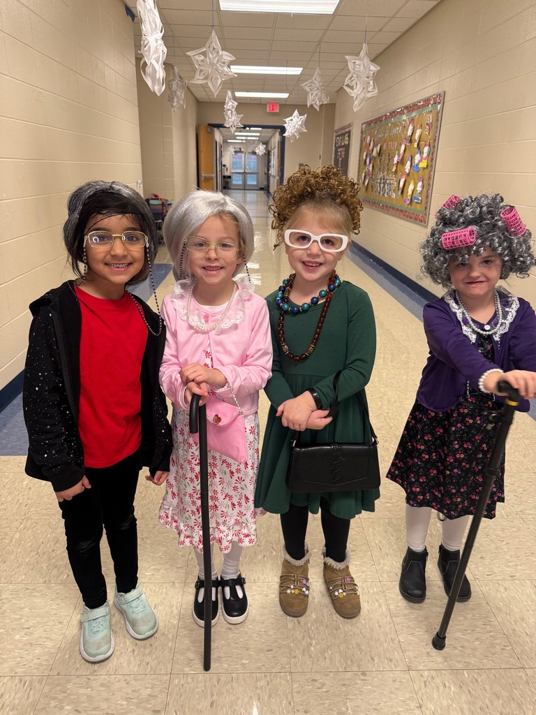 Mini Merks smiling for the 100th day of school