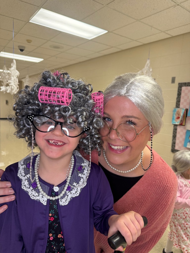 Mini Merks smiling for the 100th day of school