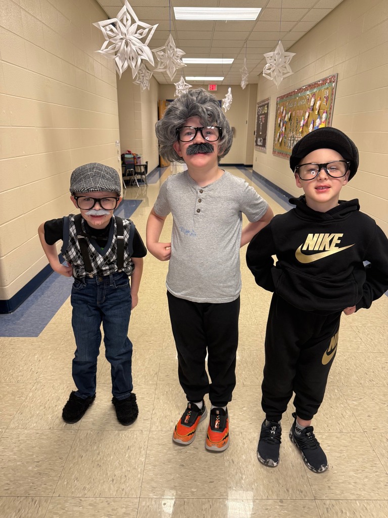 Mini Merks smiling for the 100th day of school