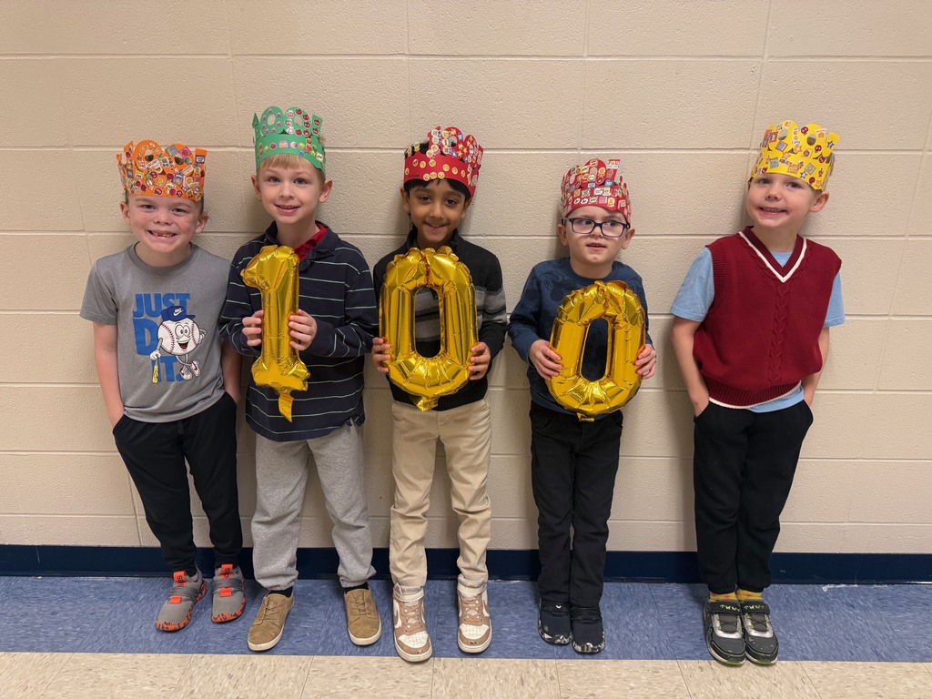 Mini Merks smiling for the 100th day of school