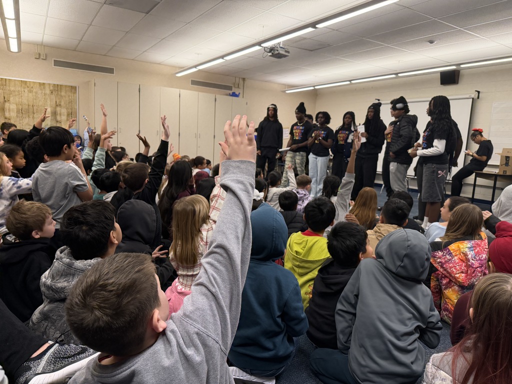 high school students reading to third grade