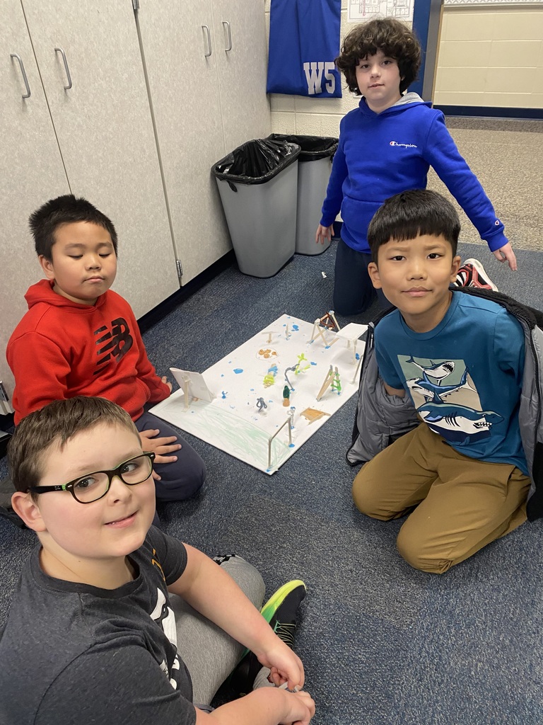 Mrs. Goodman's third grade students smiling with their playground STEM project