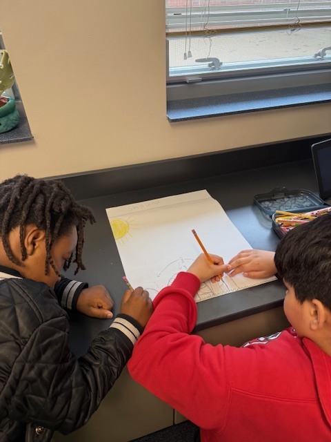 Mrs. Hoffman's 3rd grade students doing research