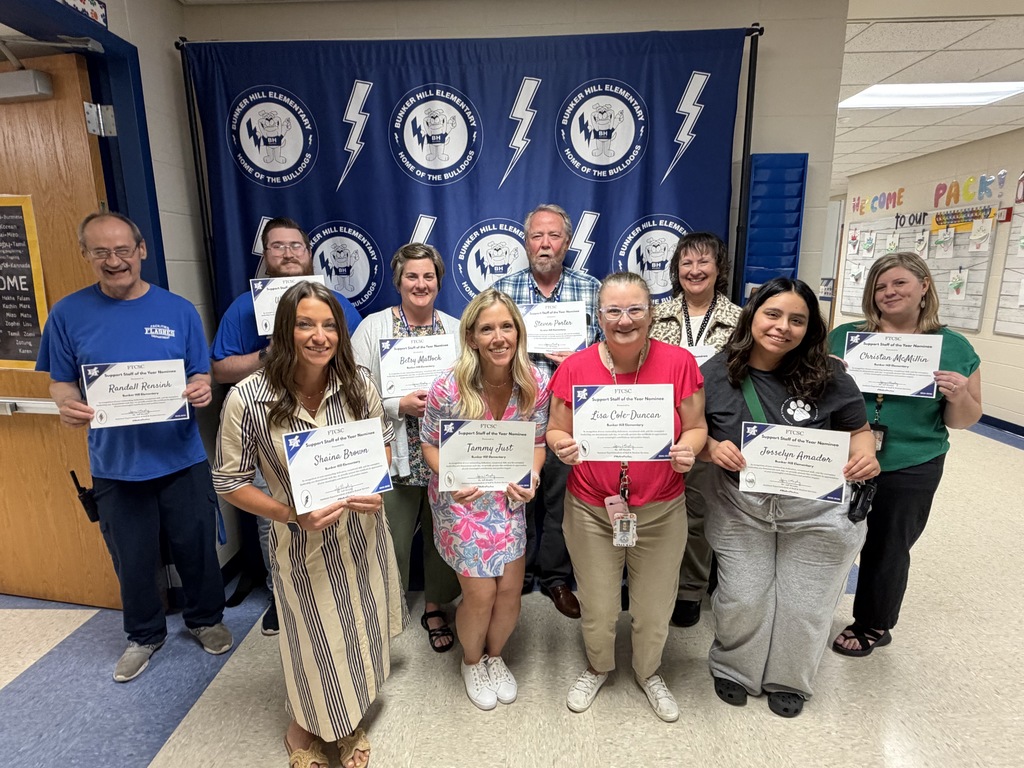 Support Staff of the Year nominees smiling together holding certificates