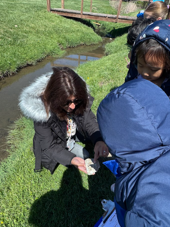 Mrs. Gorske's kindergarten students outside exploring signs of spring