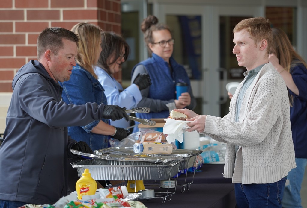 serving staff at edgewood cookout