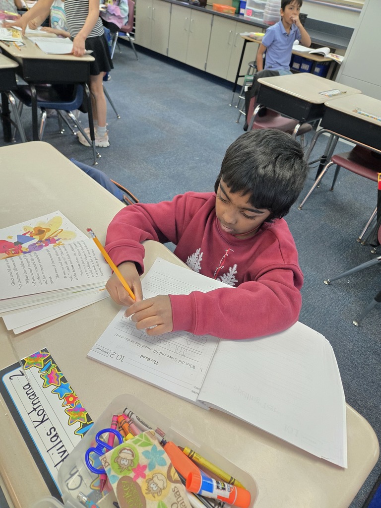 students working on school work in Ms. Hamblet's first grade class