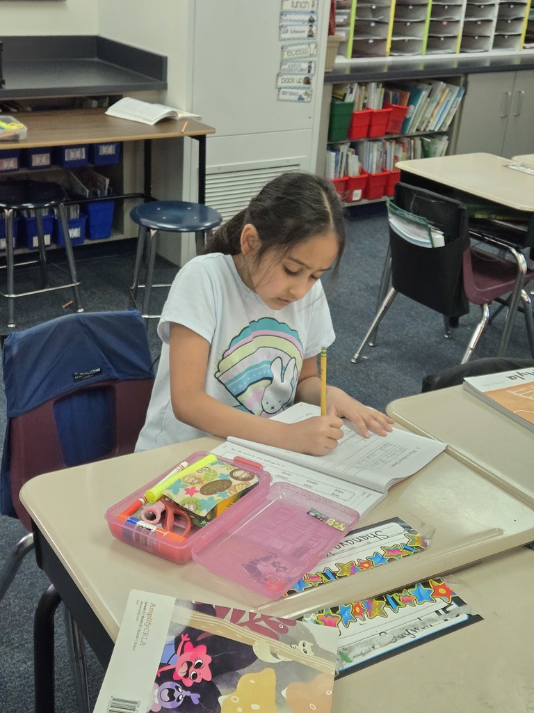 students working on school work in Ms. Hamblet's first grade class