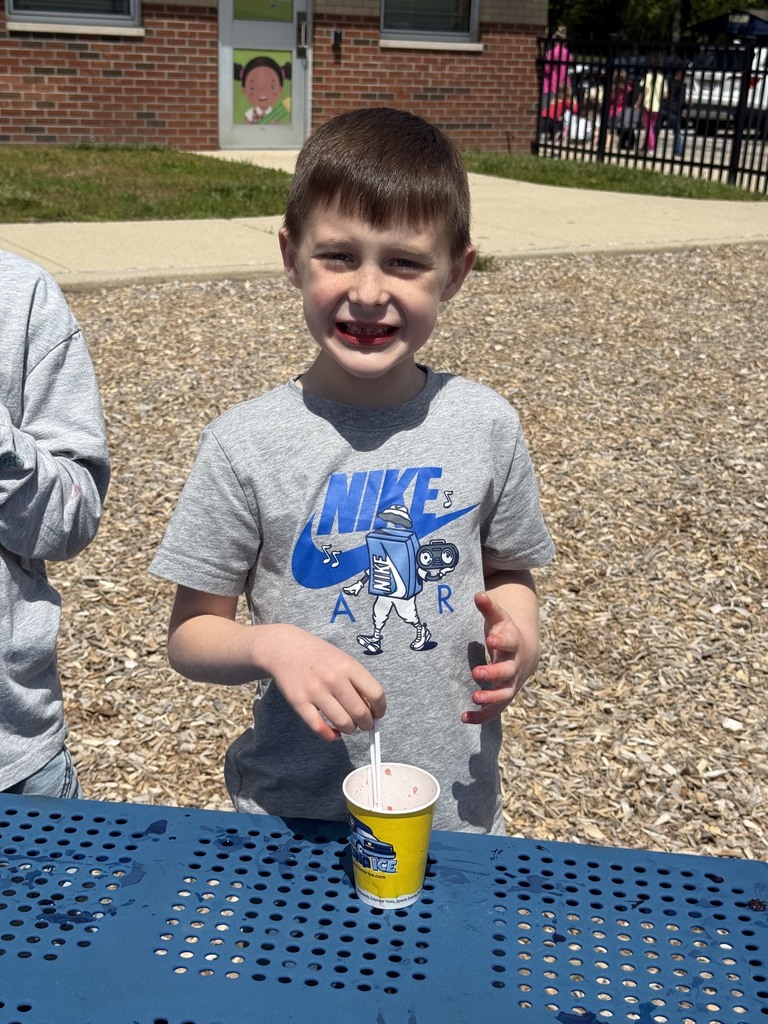kindergarten in the grass eating kona shaved ice