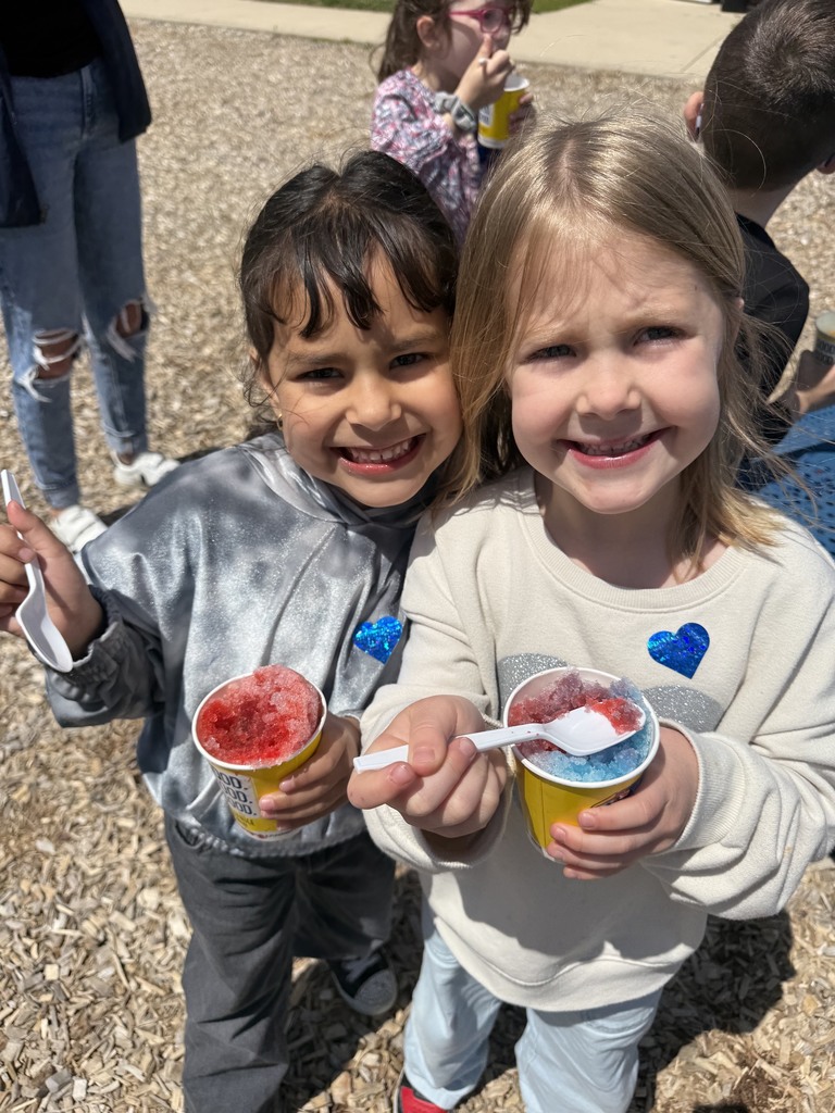 kindergarten in the grass eating kona shaved ice