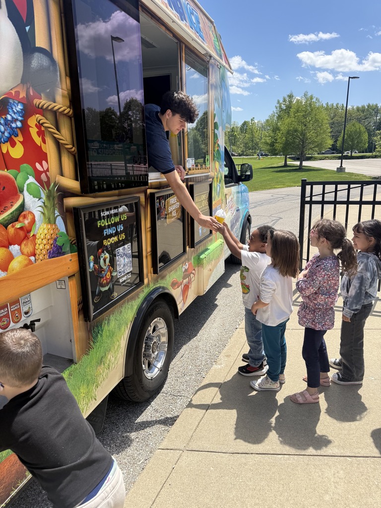 kindergarten in the grass eating kona shaved ice
