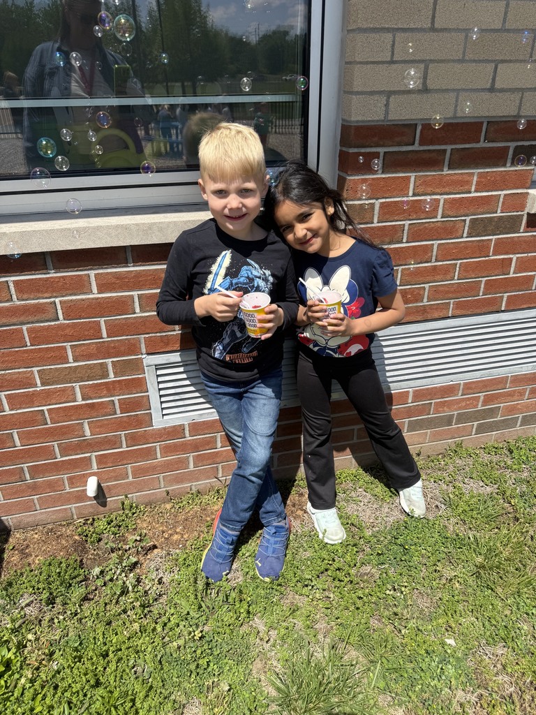 kindergarten in the grass eating kona shaved ice