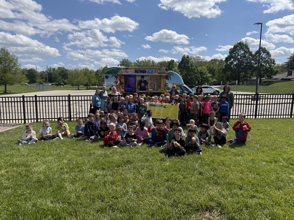 all of kindergarten in the grass eating kona shaved ice