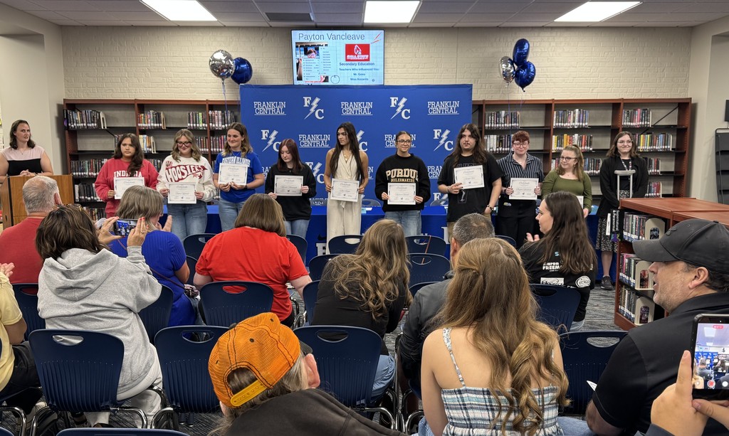 Seniors signing letters of intent to education