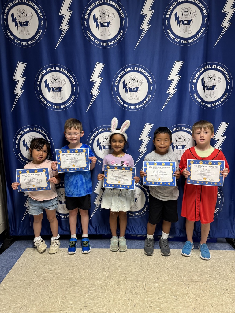 STAR students holding certificates smiling