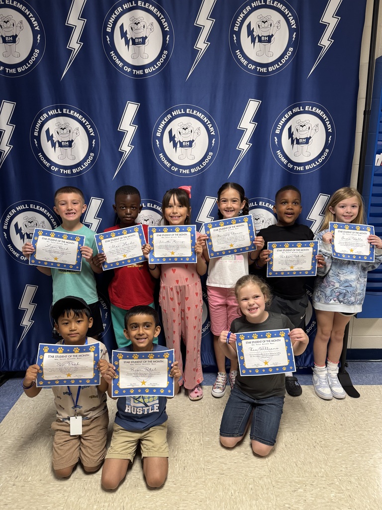 STAR students holding certificates smiling