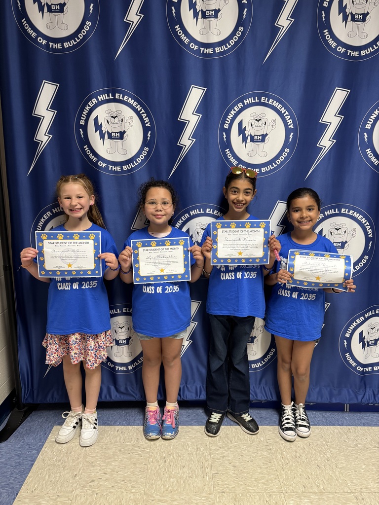 STAR students holding certificates smiling