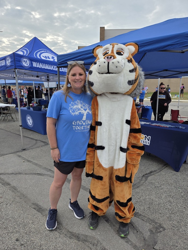 Mrs. Elliott and Ace the Acton Tiger at the Back 2 School Bash