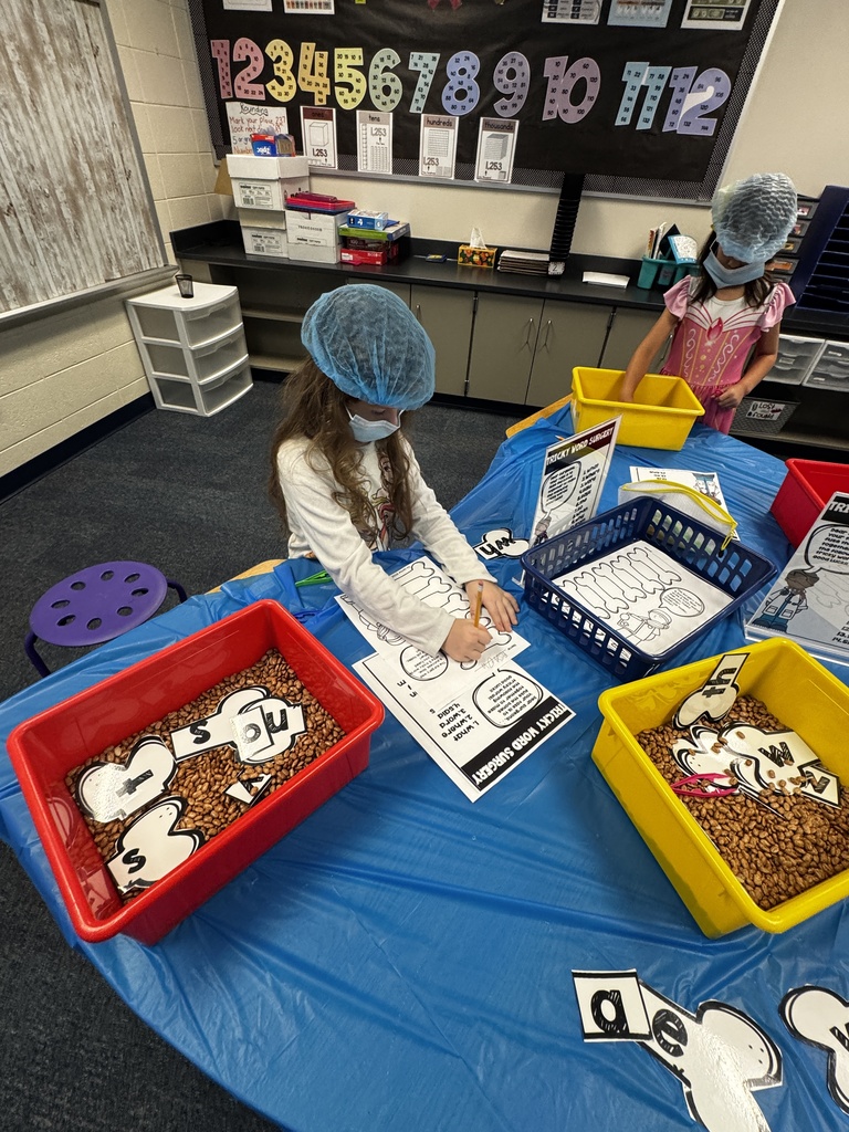 first grade OR day where students are wearing scrubs and doing body themed activities