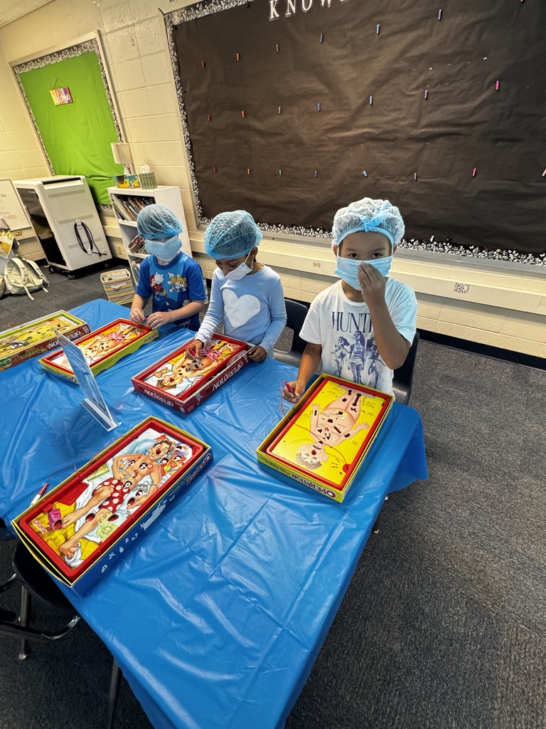 first grade OR day where students are wearing scrubs and doing body themed activities