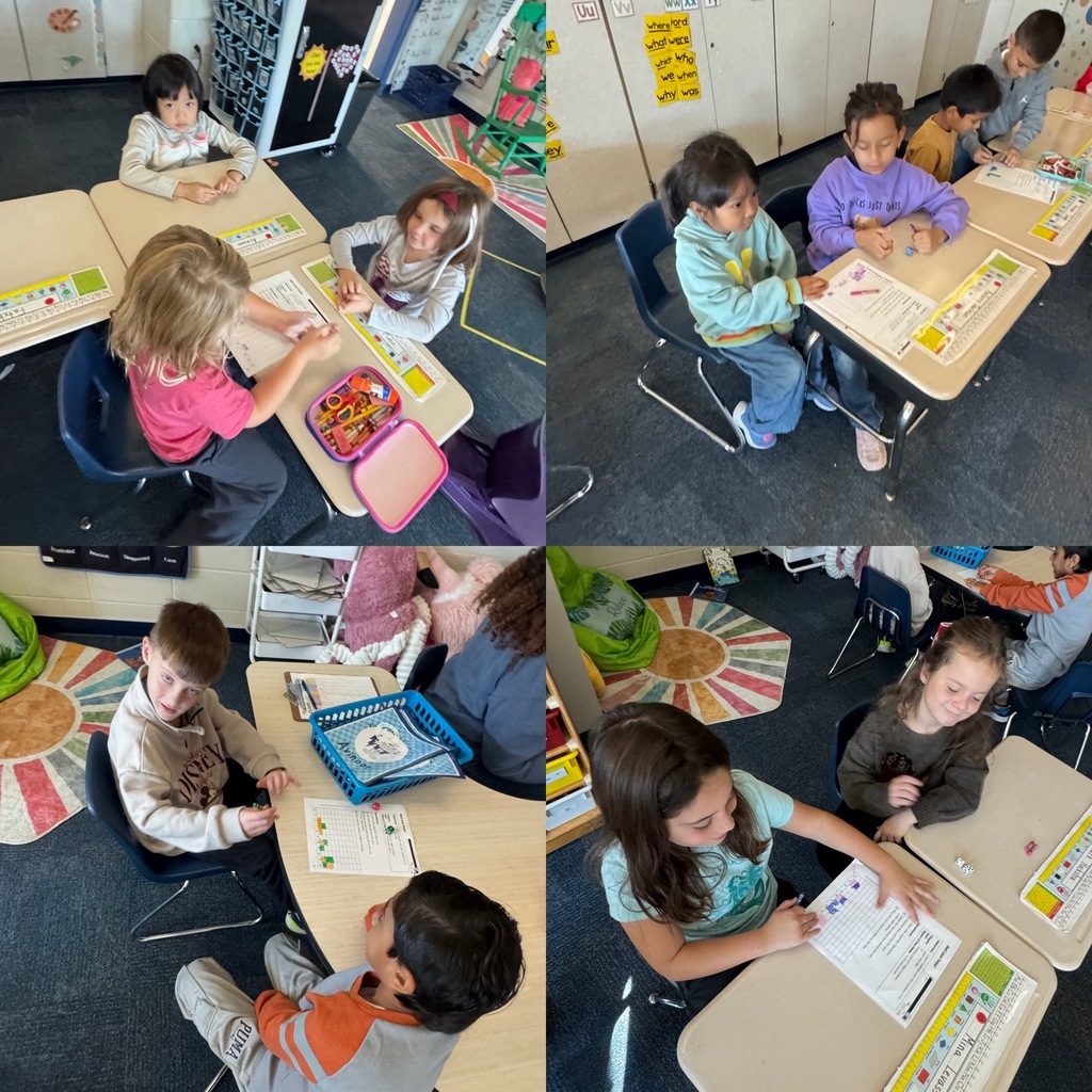students working together on addition graphing worksheet