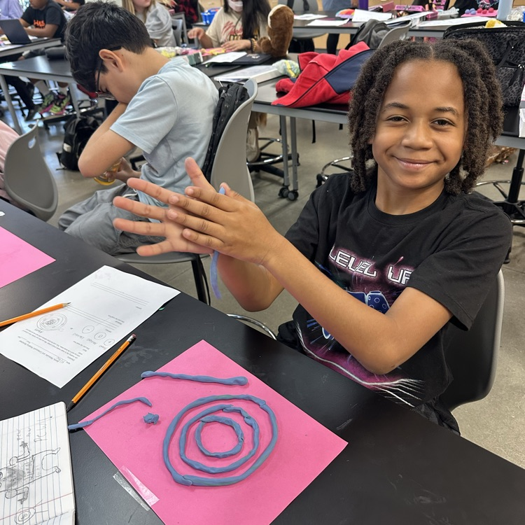 Students constructing atoms 