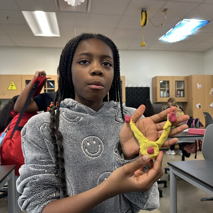 Students constructing atoms 