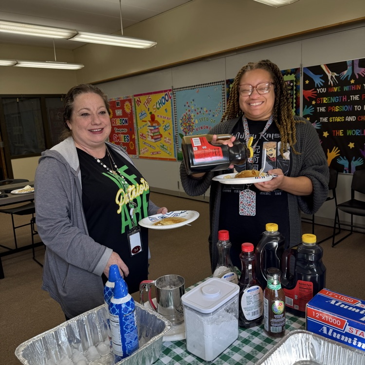 staff enjoying pancakes 