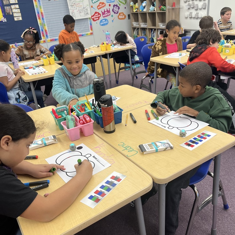 children coding with ozobots 