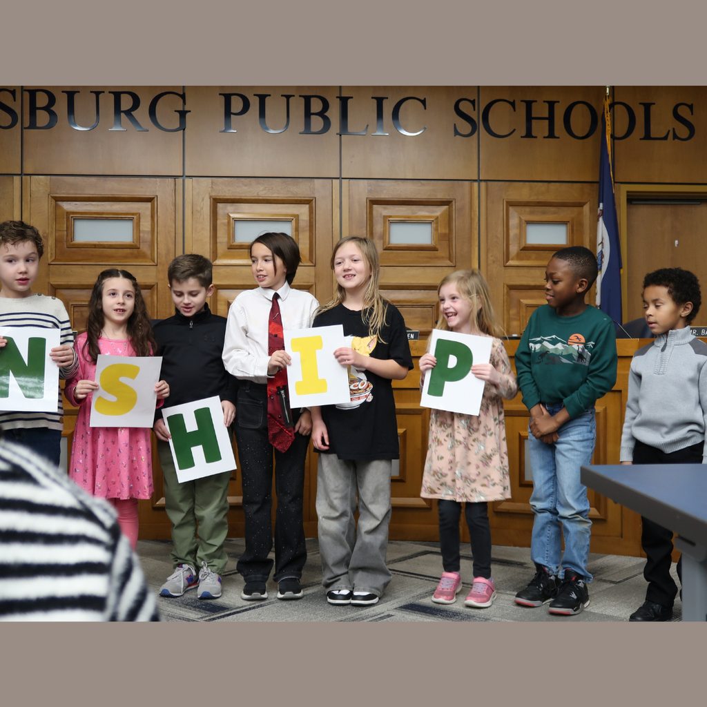 Students holding letters that form the word Citizenship