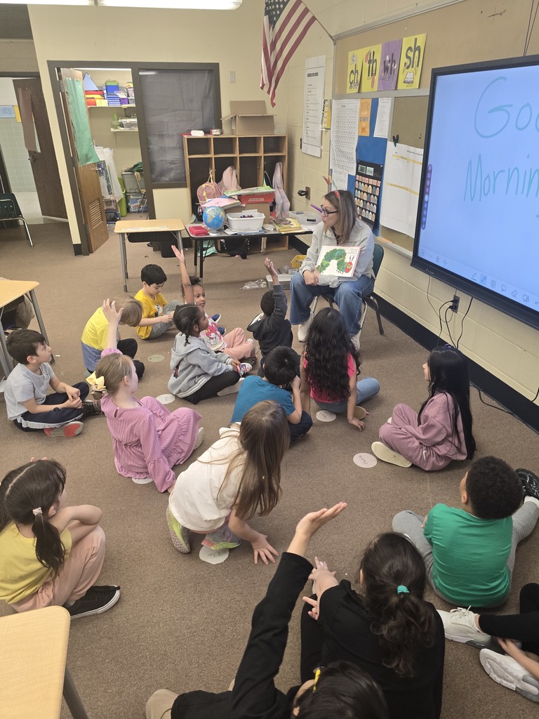 Russ  reads to class