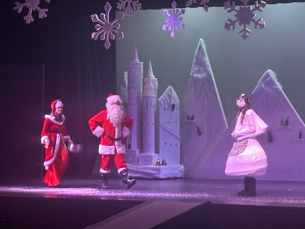 Mrs. & Mr. Claus and Sam the Snowman