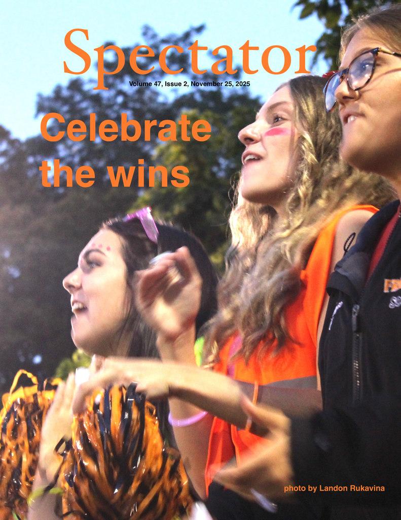 Cover photo of Spectator Vol 47 Issue 2 - Spectators at a football game.
